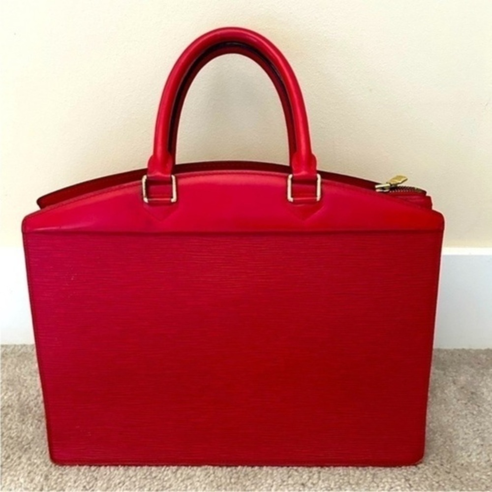 Louis Vuitton Red Satchel Bag with Structured Design
